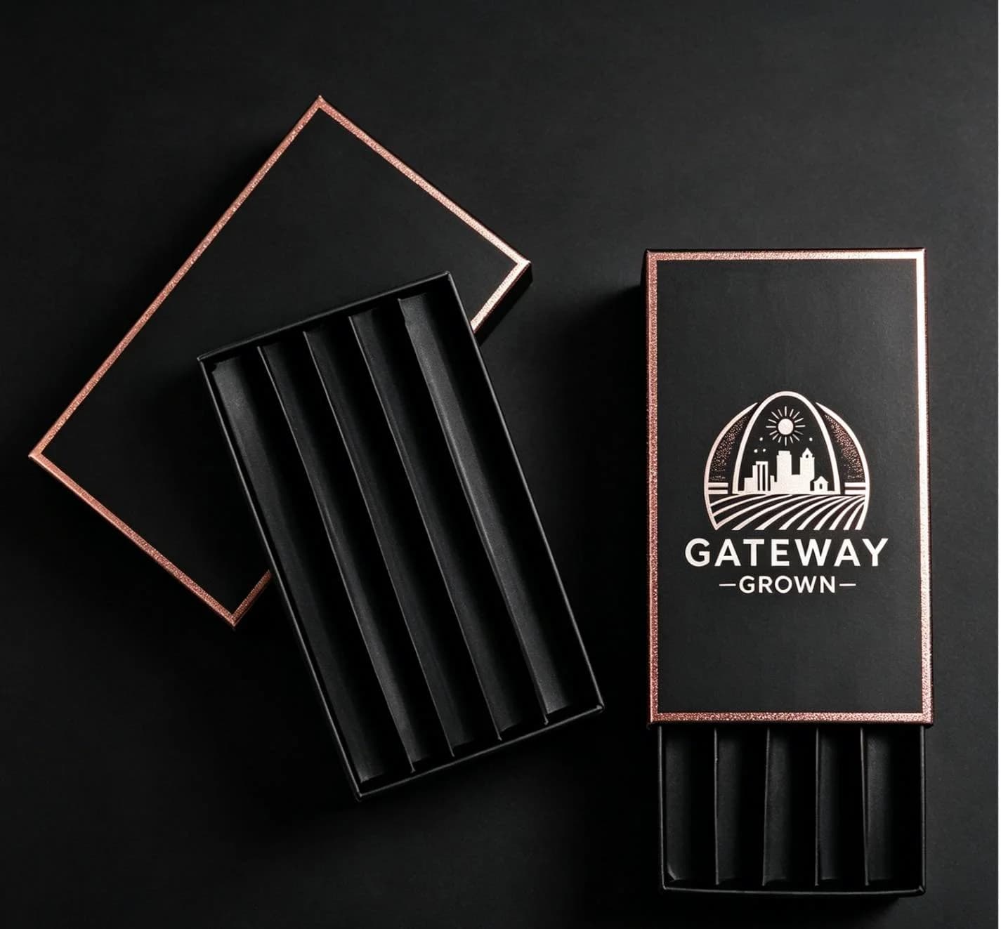 Open Gateway Grown pre-roll boxes on a black surface